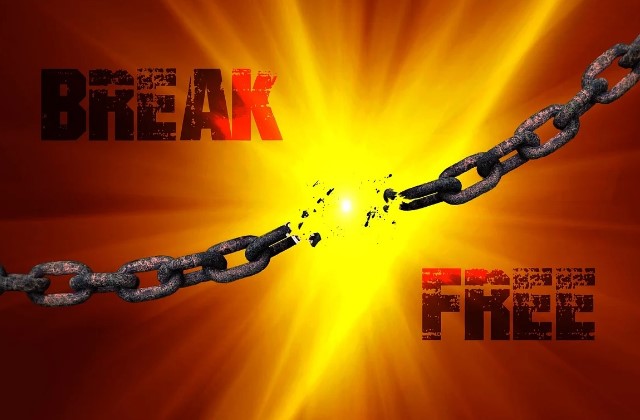 A picture of a chain breaking that says "break free" - Breaking the Chains of Propaganda with Media Awareness